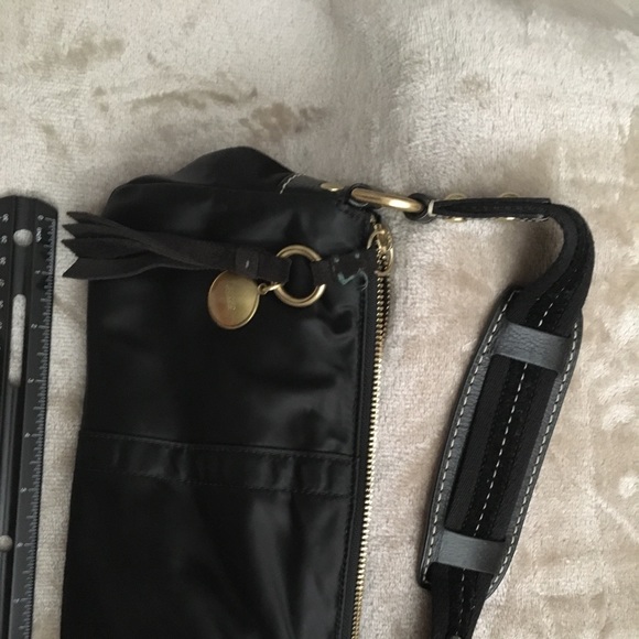 Coach handbag satin like material with charms. - Picture 2 of 3